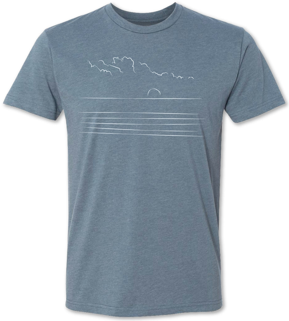 Premium unisex tee shirt with hand drawn rendition artfully drawn featuring an ocean and skyline.