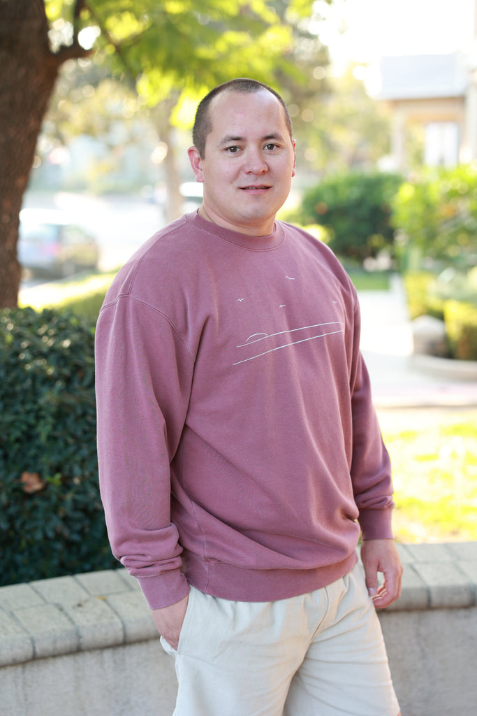 Handsome shore line inspired crew neck sweater with a rich pigment dyed color