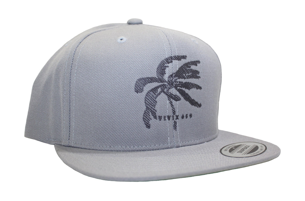 Hand drawn rendition of a palm tree on a quality wool cap